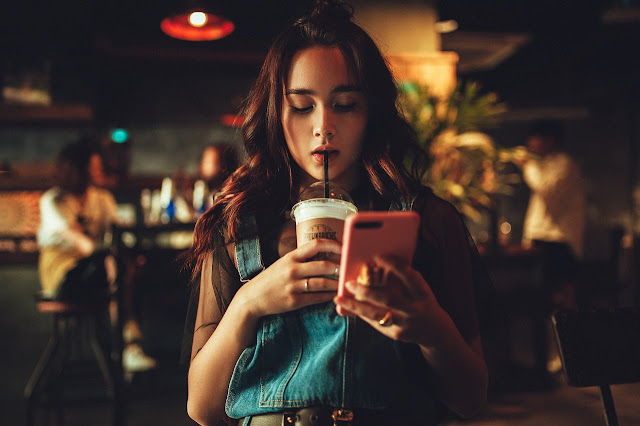 woman drinking coffee cafe-1